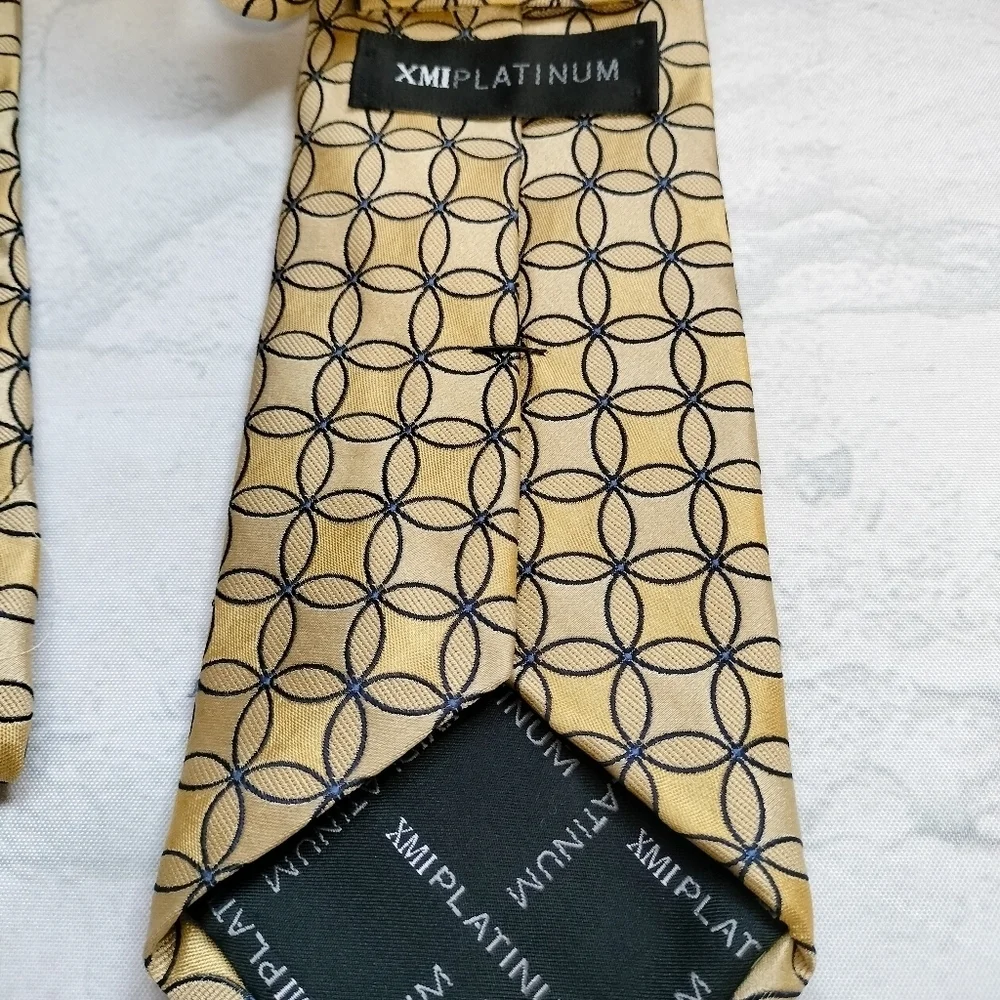XMI PLATINUM SILK NECKTIE TIE Interlocking Circles Blue Yellow Hand Made in USA